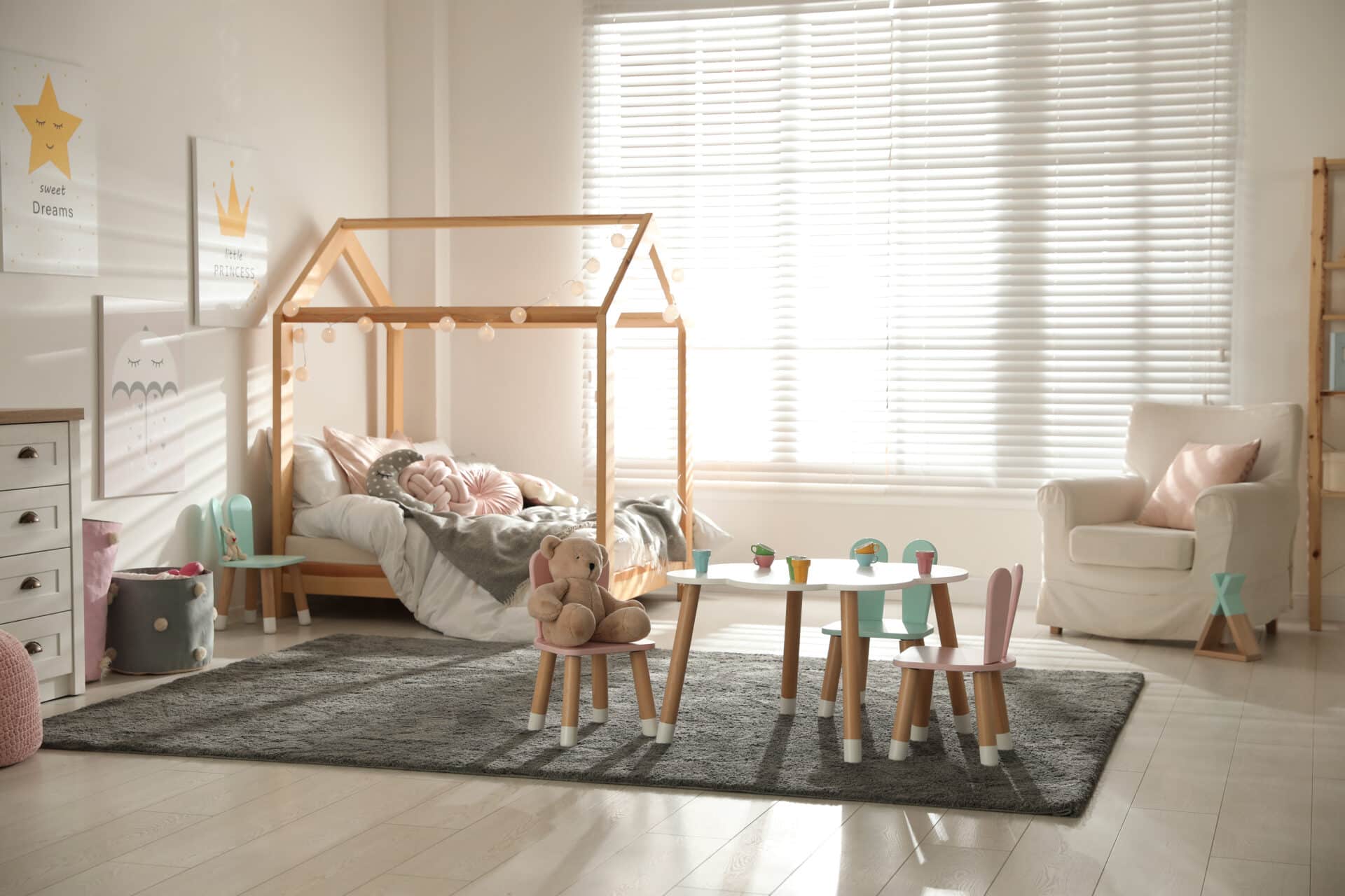 small,table,and,chairs,with,bunny,ears,in,children's,bedroom